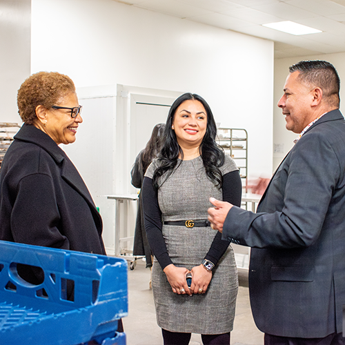 pictured left to right: LA City Mayor Karen Bass with Fresh Start Healthy Meals CEOs, Veronica Alcaraz and Juan Carlos Saucedo LA City Mayor Bass (center) visits Fresh Start Healthy Meals to tour their business operations on December 11, 2024