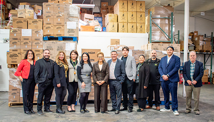 LA City Mayor Bass (center) visits Fresh Start Healthy Meals to tour their business operations on December 11, 2024